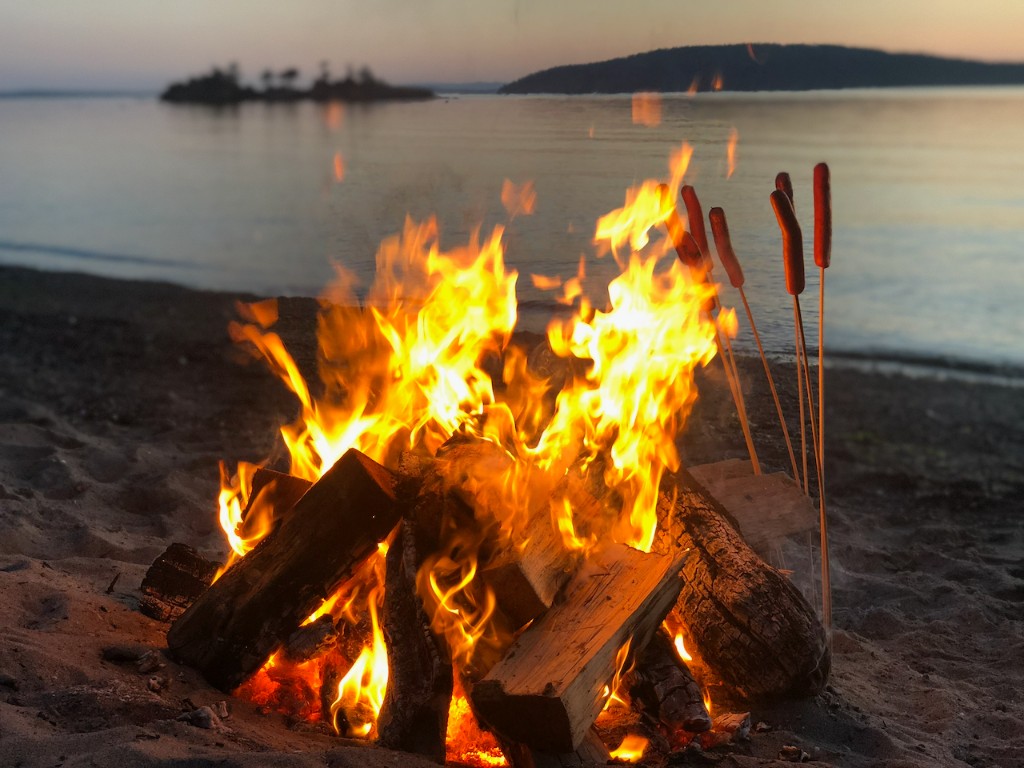 Campfire on the beach at dusk
